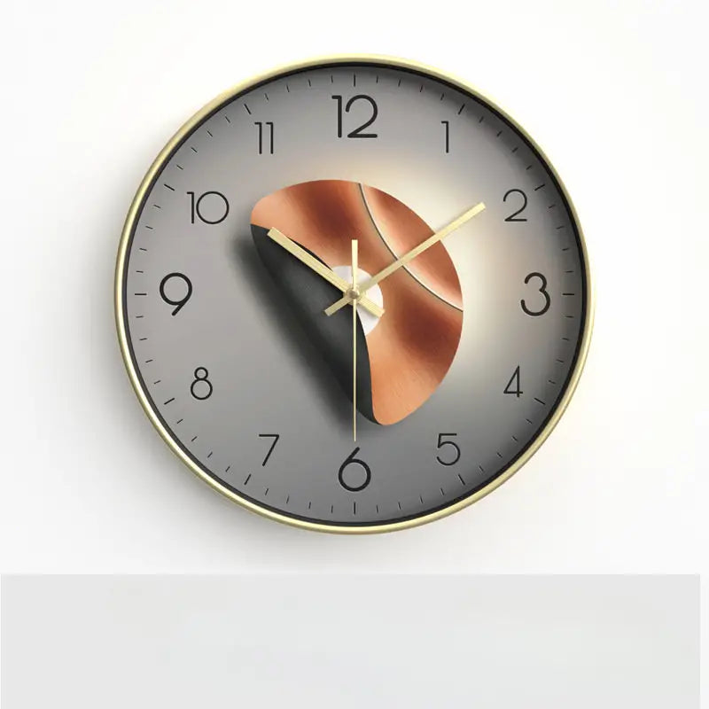 Wall clock with a modern design featuring a copper leaf on a gray background