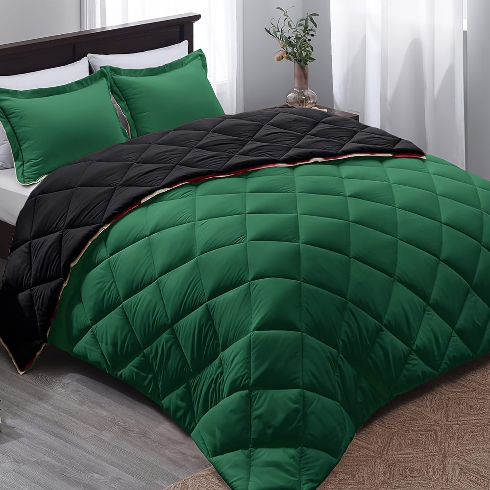 Green and black quilted comforter on a bed in a bedroom setting.