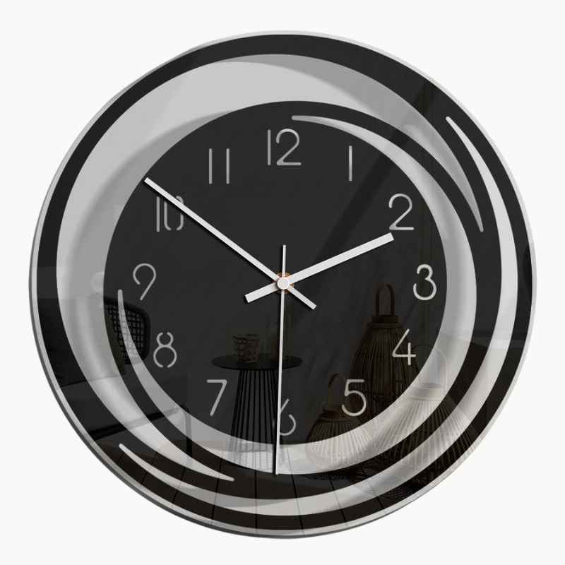 Wall clock with black face and silver frame on a beige background