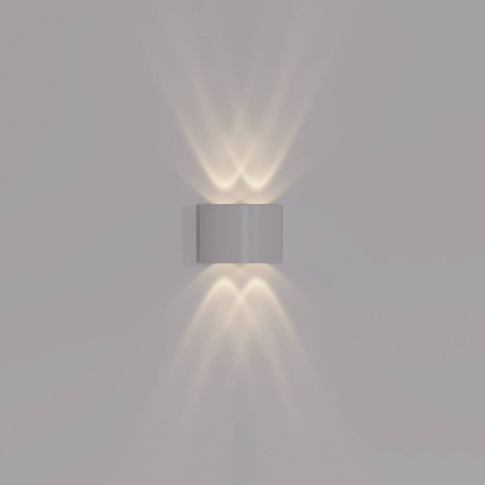 Modern wall-mounted light fixture on a plain wall