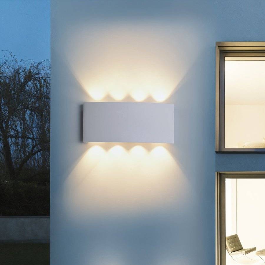 Modern wall-mounted outdoor light fixture on a building exterior.
