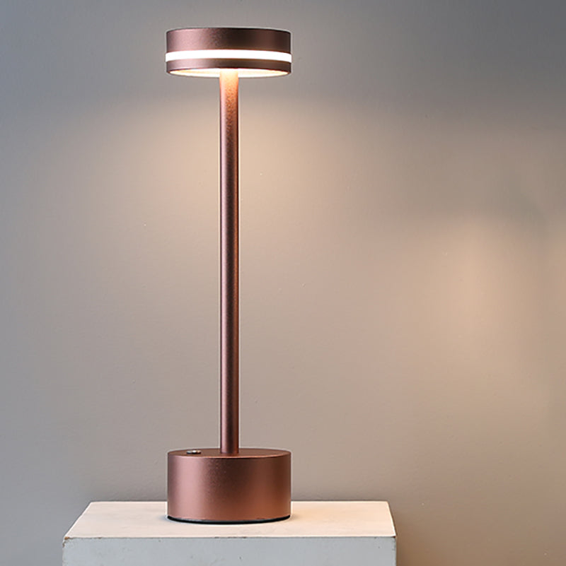 Copper-colored outdoor lamp on a neutral background