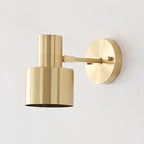 Gold wall sconce on a white background
