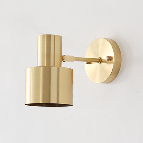 Gold wall sconce on a white background