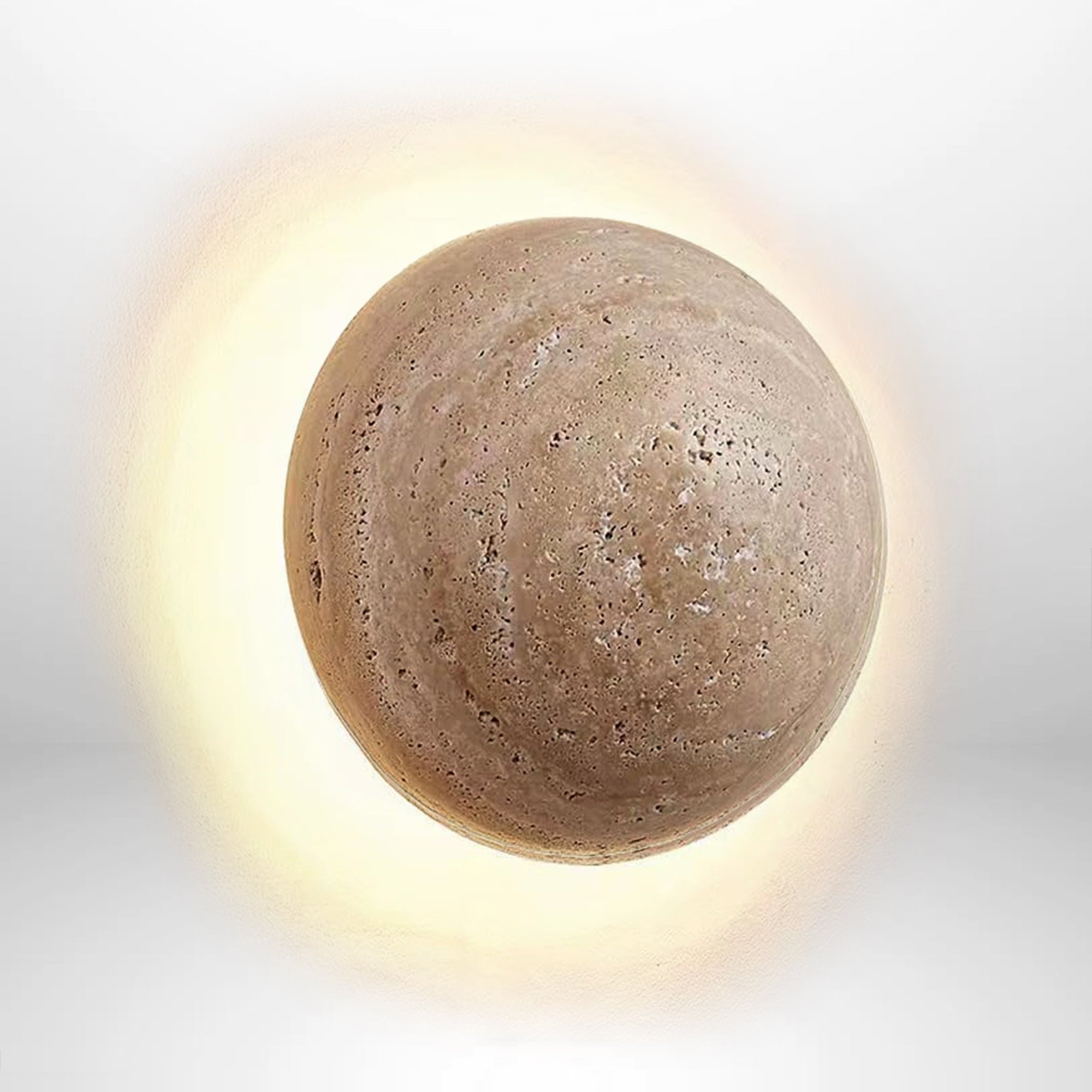 Round wall light on a textured wall.