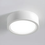 Round ceiling light fixture on a gray background