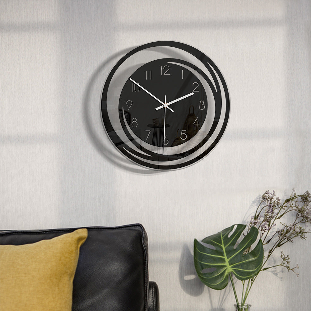 Black and white wall clock on a light background
