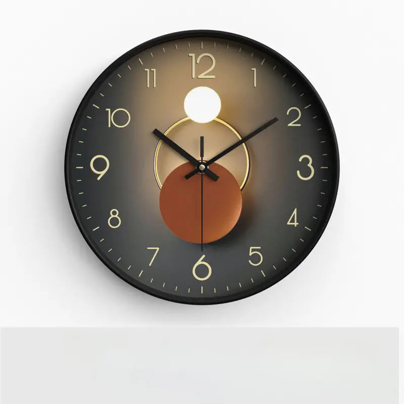 Round wall clock with a black frame and brown center on a white background
