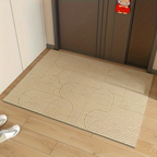 Beige doormat with arch pattern on a wooden floor, next to a closed door.
