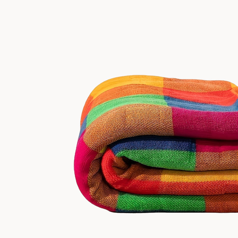 Folded colorful striped fabric on a white background