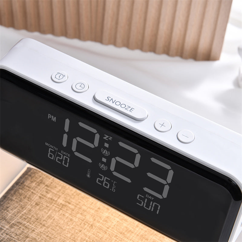 Digital clock with time display on a wooden surface