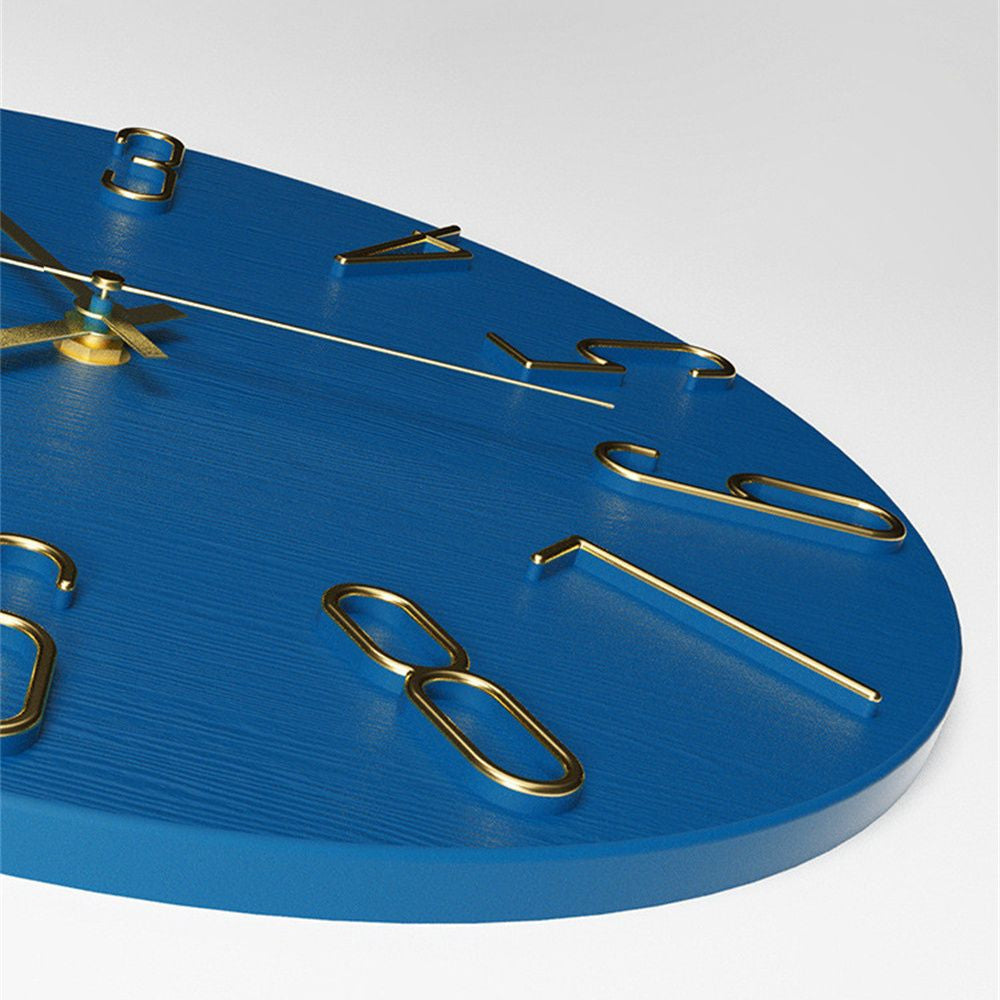 Blue wall clock with gold hour markers on a white background