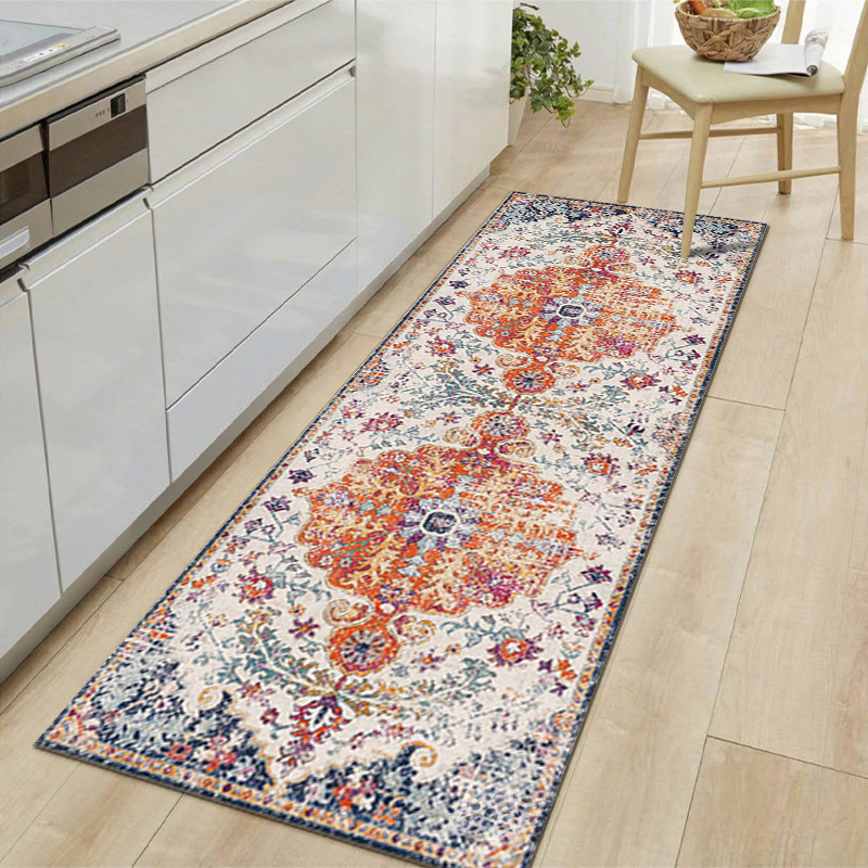Decorative floral rug on a wooden floor in a kitchen setting