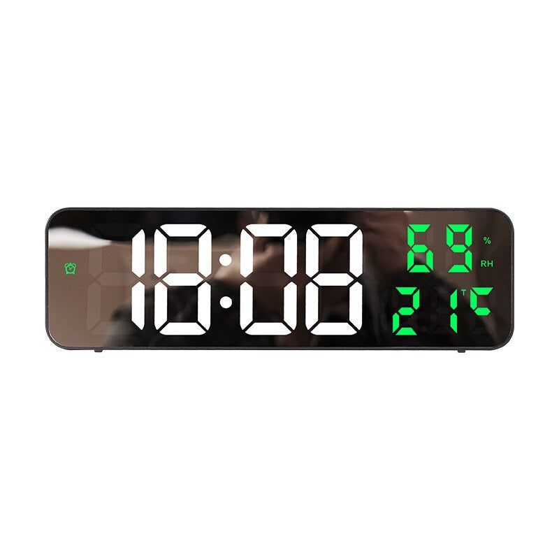 Digital clock with large LED display on a white background