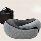 Gray travel neck pillow with black mesh and drawstring bag on a beige background