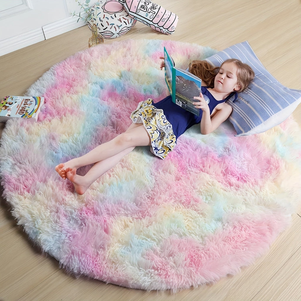 Child reading a book on a colorful fluffy rug in a room.