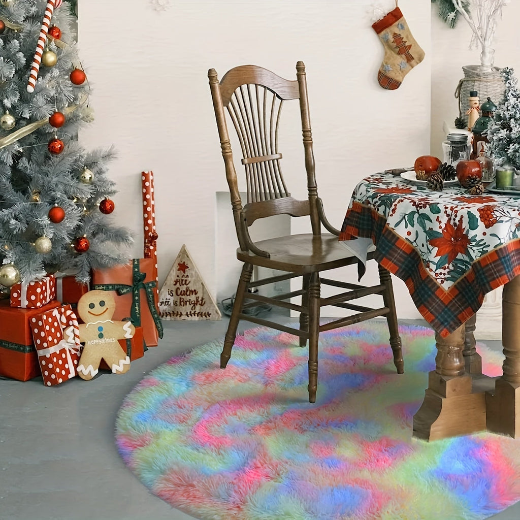 Decorated room with Christmas tree, chair, and table with a colorful rug.