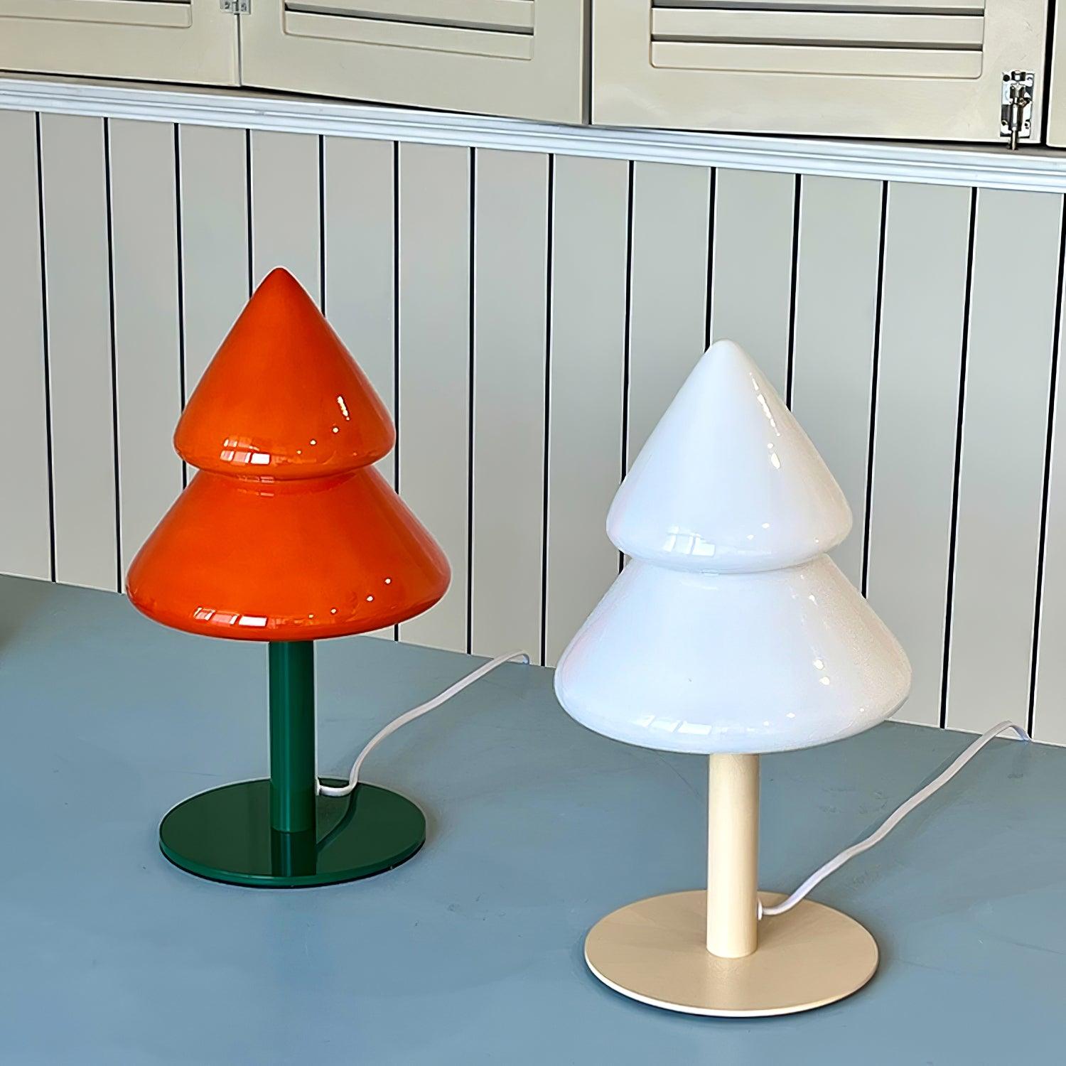 Two unique table lamps with cone-shaped designs on a flat surface.