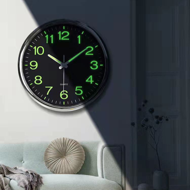 Wall clock with green numbers in a living room setting