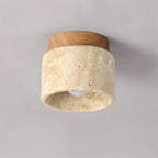 Ceiling light fixture with wooden top and beige stone base on a gray background