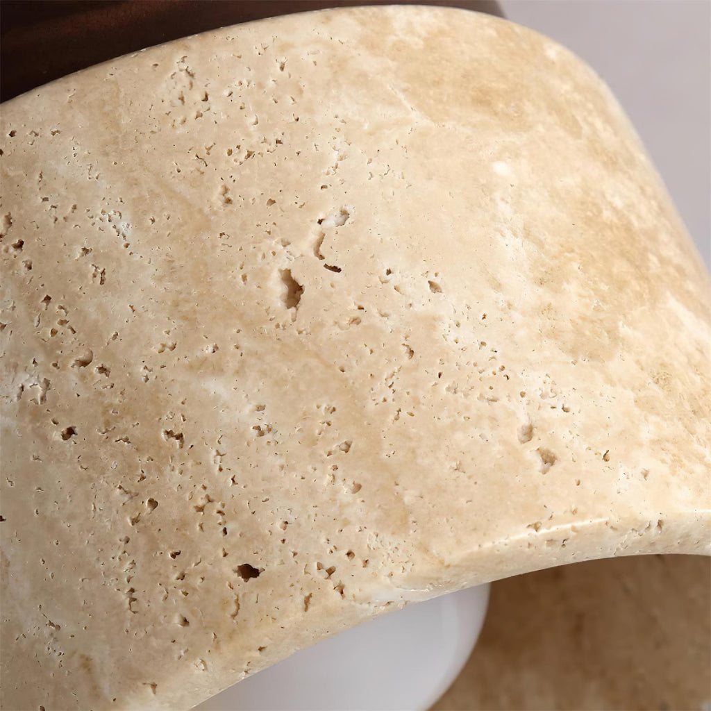 Close-up of a piece of bread on a white plate with a neutral background