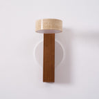 Modern wall lamp with wooden base and concrete-like shade