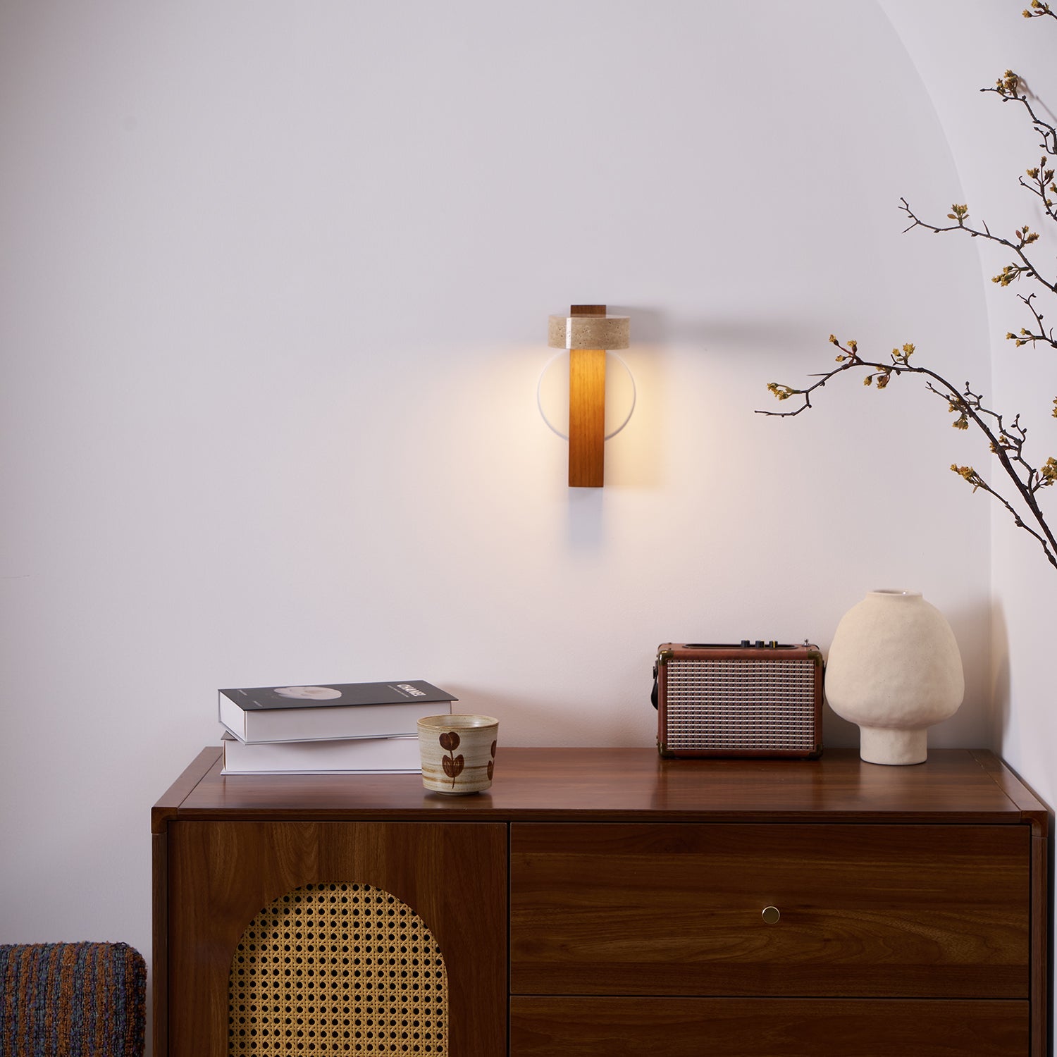 Modern wall lamp with wooden base and concrete-like shade