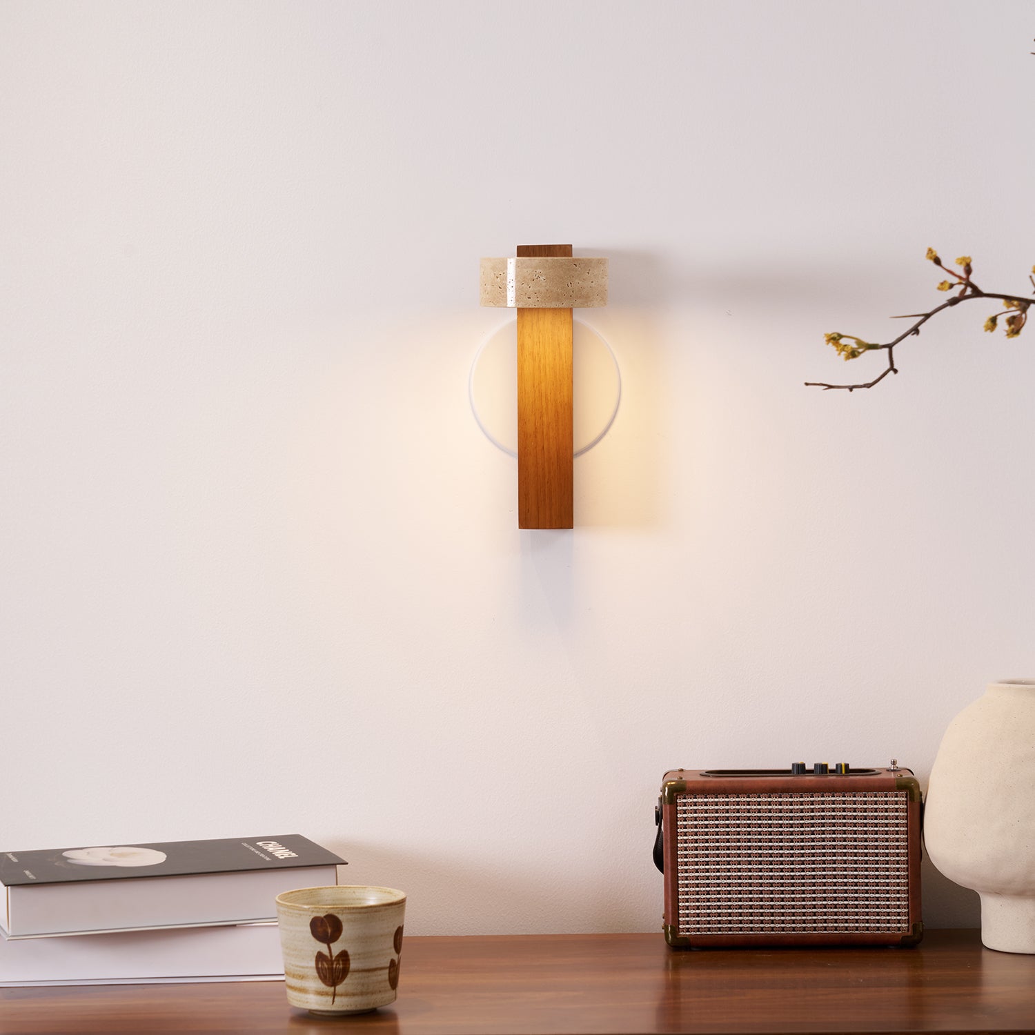 Modern wall lamp with wooden base and concrete-like shade