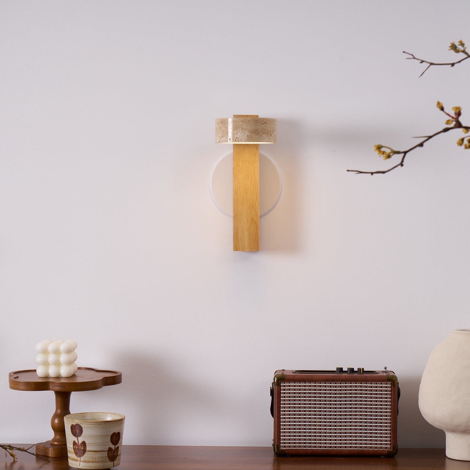 Modern wall lamp with wooden base and concrete-like shade