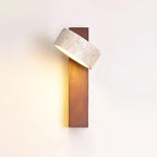 Modern wall-mounted light fixture with wooden base and concrete-like top on a white background