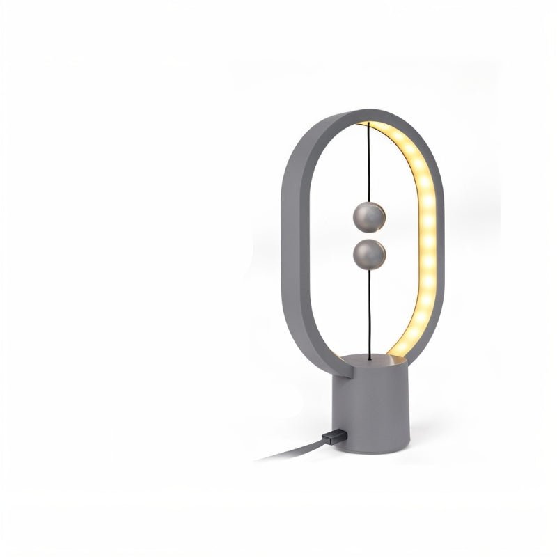 Gray balance ball lamp on a white background